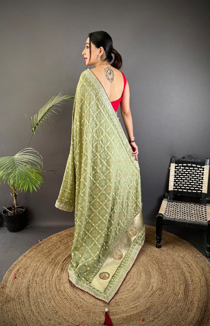 Traditional blooming vichitra khadi bandhej silk saree with sequence work