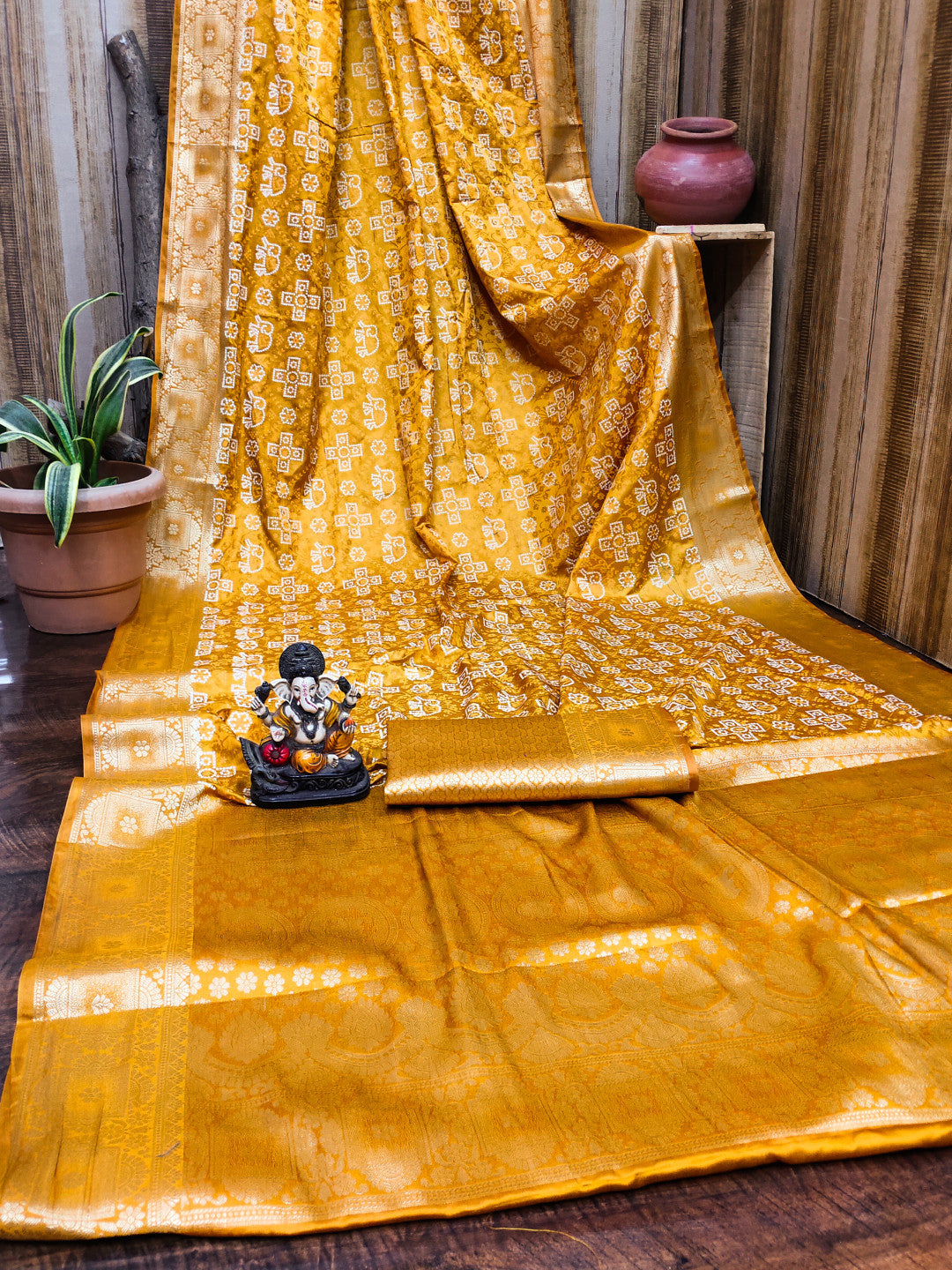 Satin Silk Bandhej Saree with Zari Weaving Border & Pallu