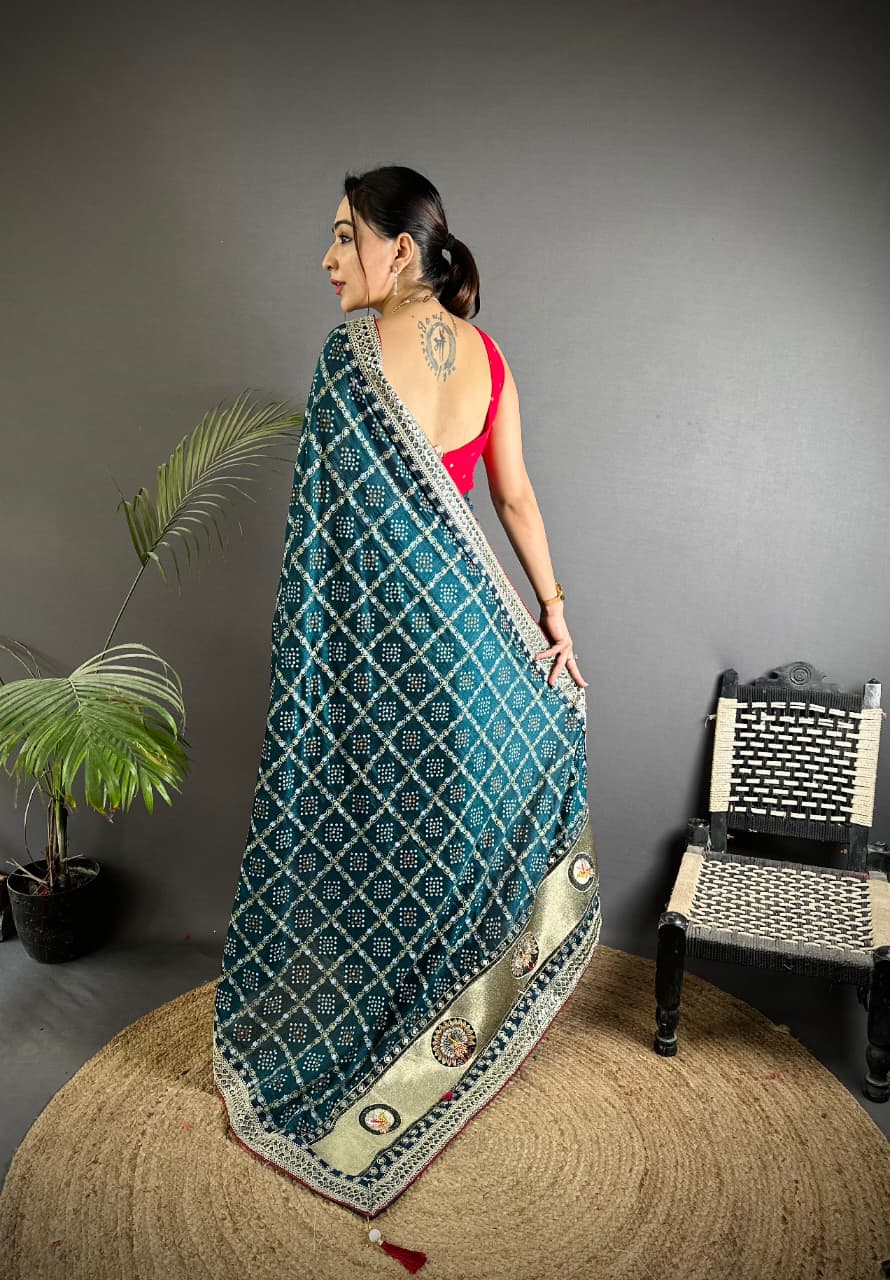 Traditional blooming vichitra khadi bandhej silk saree with sequence work