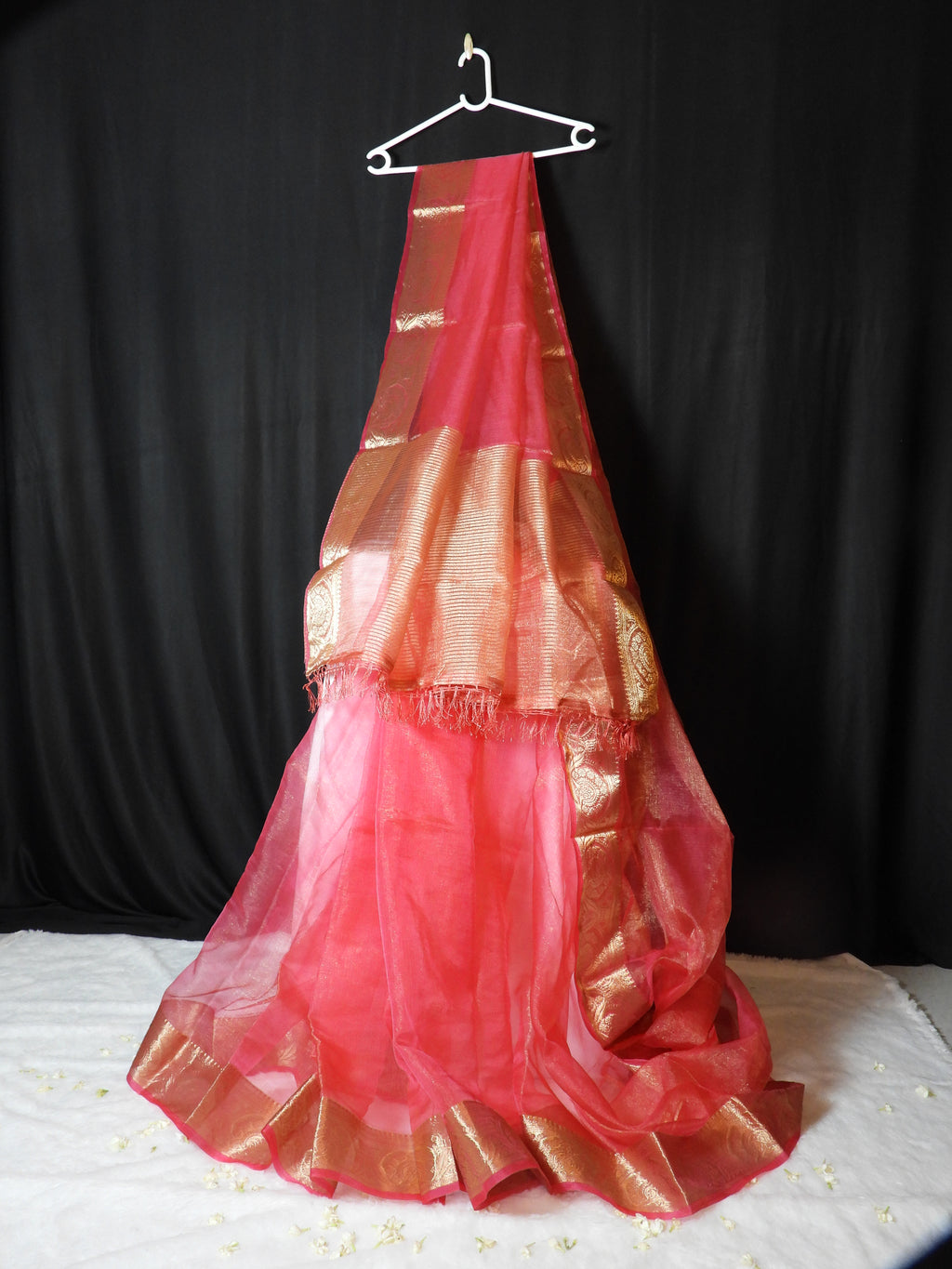 Coral Pink Shimmer Organza Saree with Intricate Zari Border