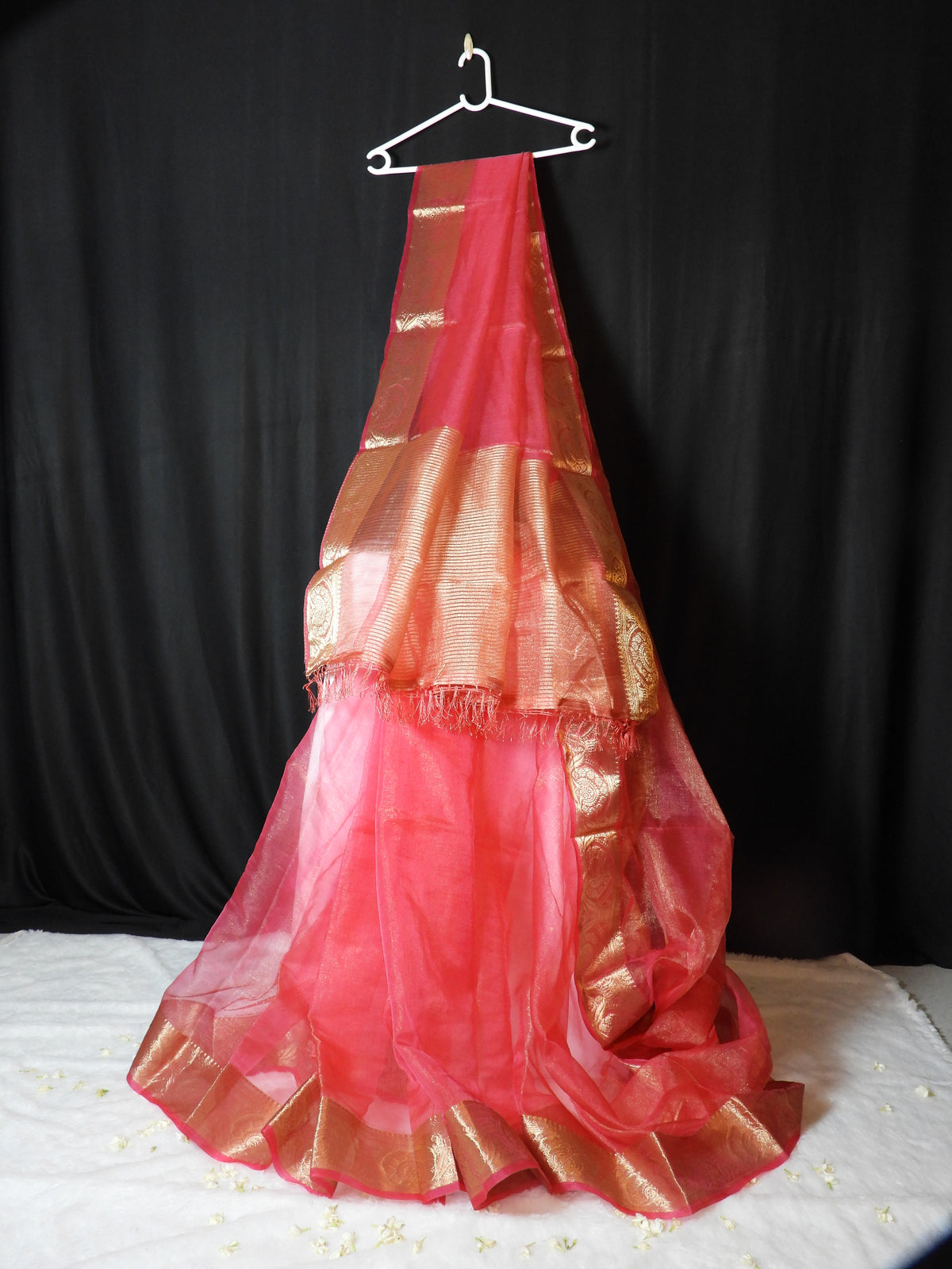 Coral Pink Shimmer Organza Saree with Intricate Zari Border