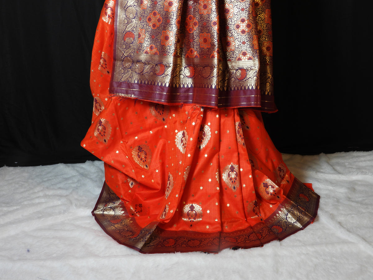 Classic Orange Silk Saree with Rich Zari Pallu & Traditional Motifs
