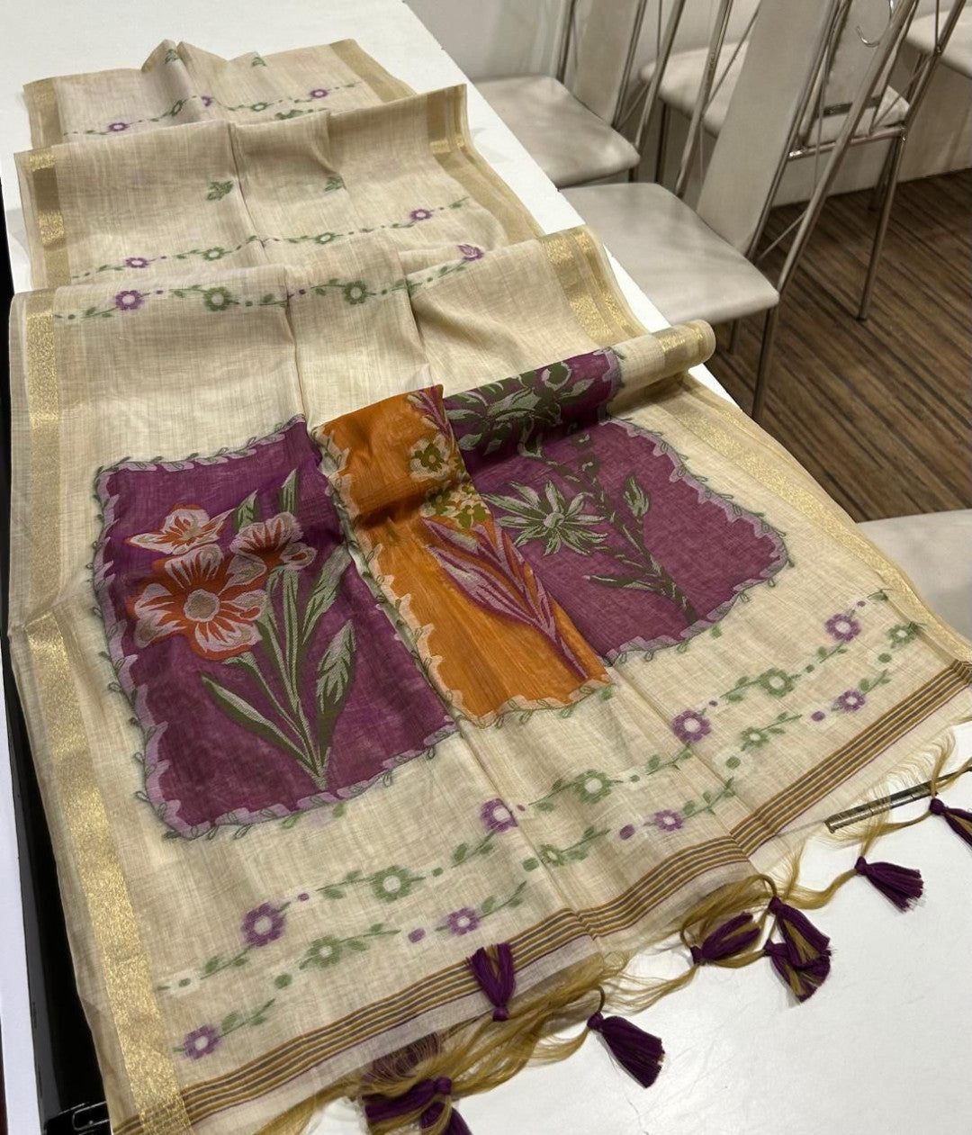 Premium muga cotton saree with multi colour flower weaving pallu