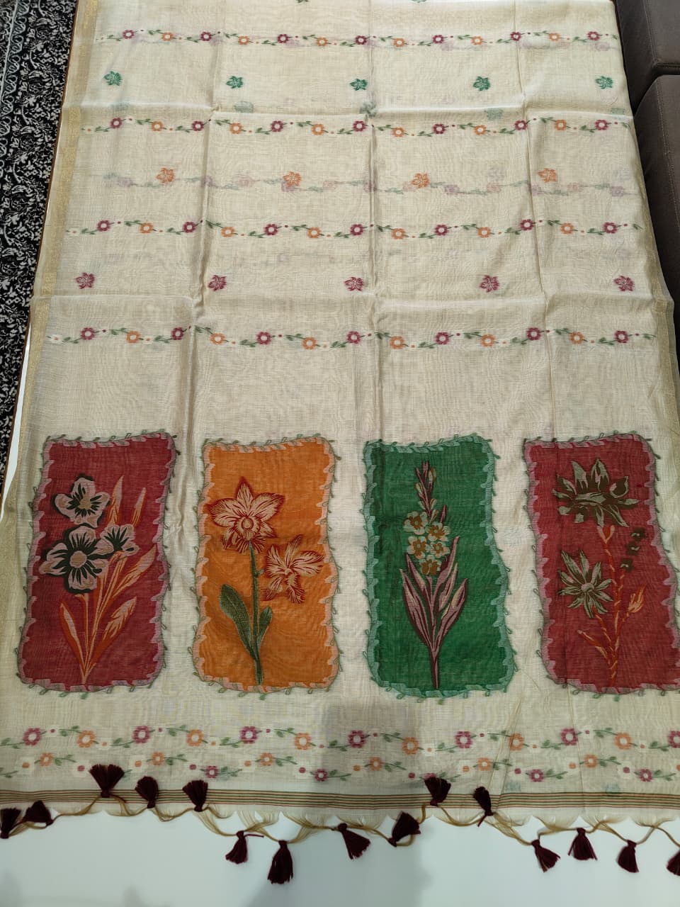 Premium muga cotton saree with multi colour flower weaving pallu
