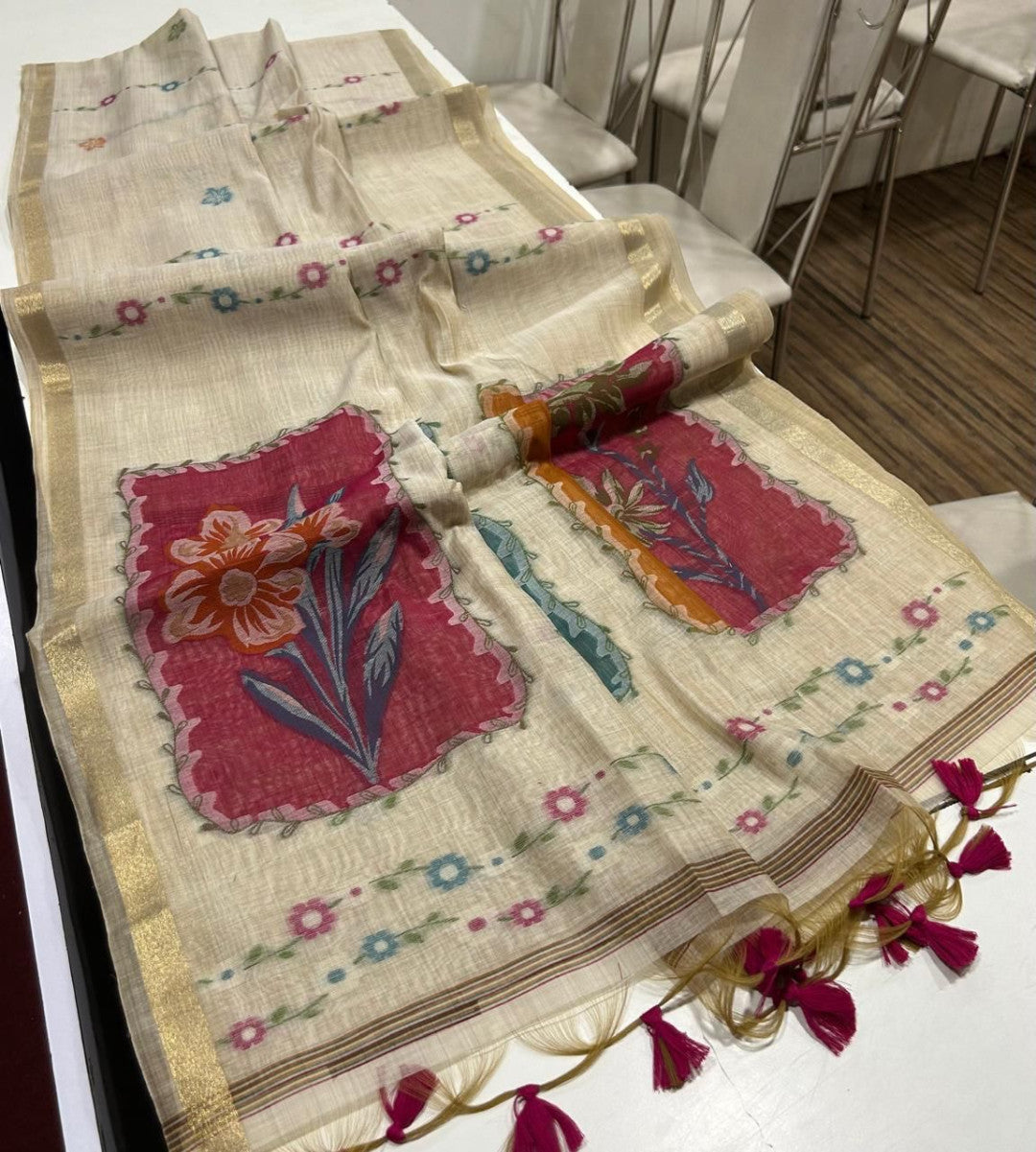 Premium muga cotton saree with multi colour flower weaving pallu