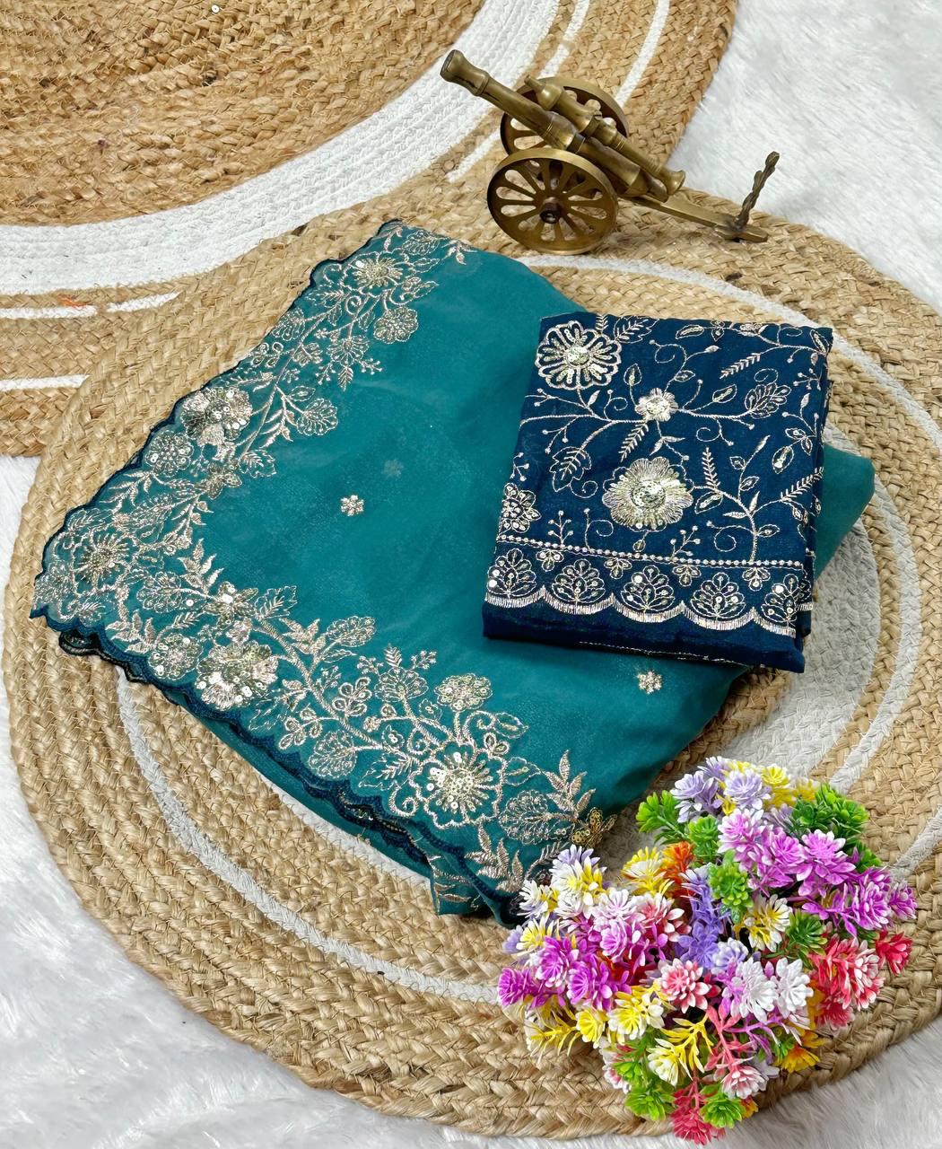 Heavy star georgette silk saree with zari weaving and thread embroidered work